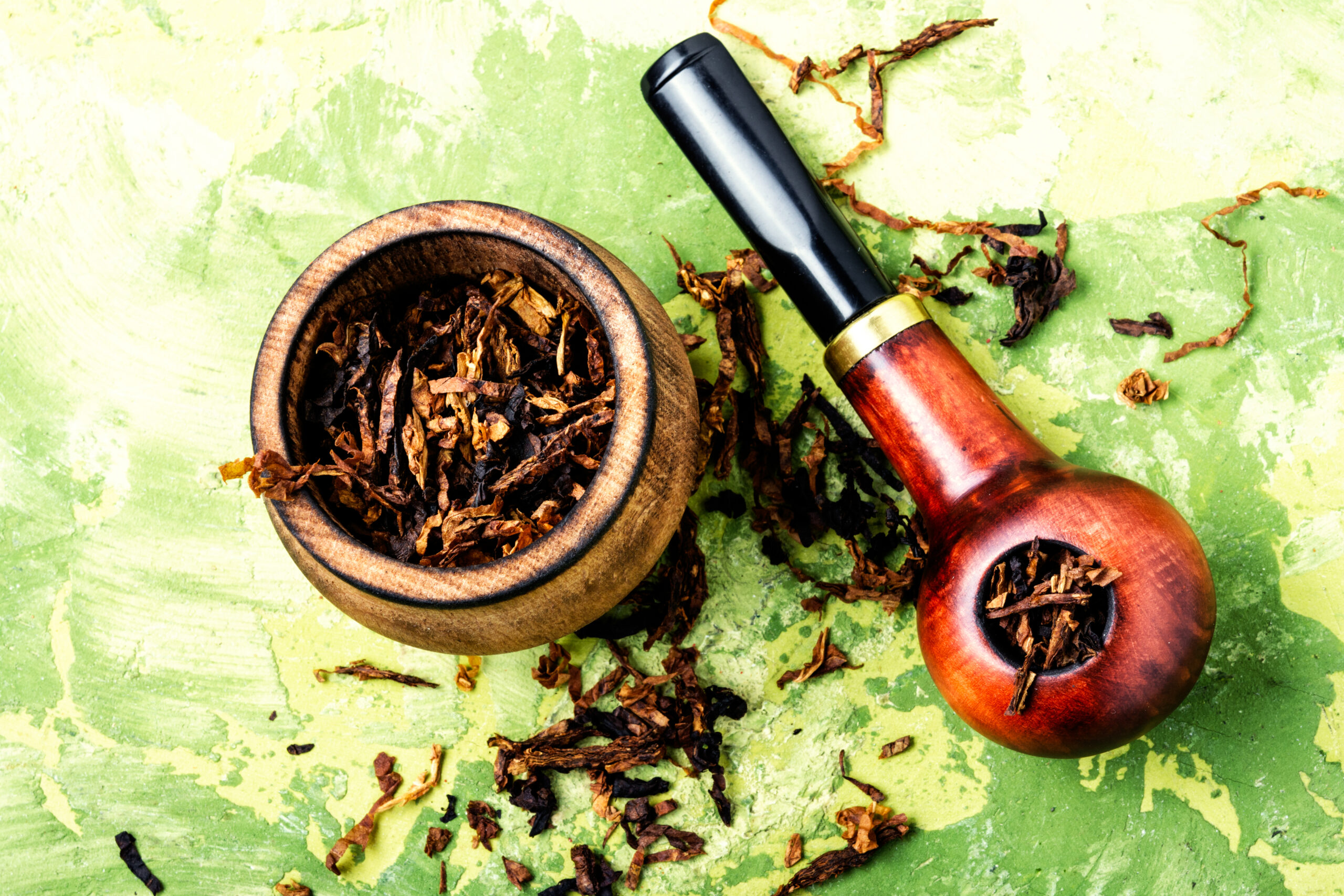 Tobacco pipe or smoking pipe.Classic wooden pipe with tobacco